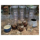 THREE WATER PITCHERS WITH SET OF GLASSES INSIDE,