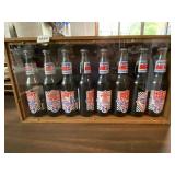 RICHARD PETTY SET OF 8 LONGNECK PEPSI IN DISPLAY