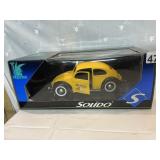 SOLID YELLOW DIE CAST CAR IN OB