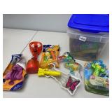 PLASTIC CONTAINER WITH VARIOUS KIDS TOYS SEE