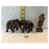 CARVED WOOD CONNECTED ELEPHANTS AND MAN CARRYING