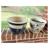 TWO POTTERY PLANTERS WITH FLOWER DESIGN
