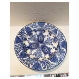 BLUE, WHITE POTTERY PLATE SIGNED BACK STRIG