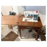 SINGER SEWING MACHINE W/ CABINET AND FOOT CONTROL