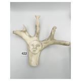 CARVED ANTLER 10" X 9" ANIMAL FIGURES AND MOON IN