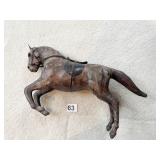 LEATHER WRAPPED HORSE 9" H X 15" W GOOD CONDITION