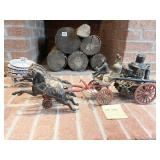 IMPRESSIVE CAST IRON FIREMAN BEING PULLED BY 3