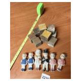 SIX ANTIQUE BISQUE DOLLS AND OLD WOODEN BLOCKS