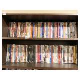 2 FULL SHELVES OF DVDS, SOME CASES EMPTY