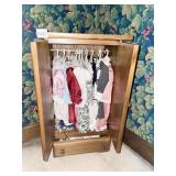 PLEASANT GIRL WARDROBE AND CLOTHES ON HANGERS