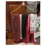 ASSORTMENT OF SCARVES ON GOLD HANGER, SOME SILK,