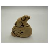 JAPANESE CARVED BONE NETSUKE.
