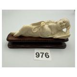 CARVED BONE RECLINING BUDDHA FIGURE, 4.5 INCHES