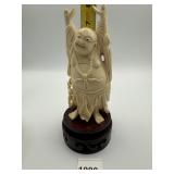 CARVED BONE STATUE OF A LAUGHING, HAPPY BUDDHA
