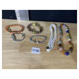 BRACELETS, NECKLACES