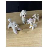 4 POODLE DOGS
