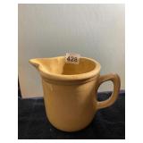 YELLOW STONEWARE PITCHER