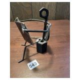 METAL FIGURE READING THE WALL STREET JOURNAL