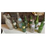 ASSORTED GLASS SODA BOTTLES INCLUDING UPPER 10,