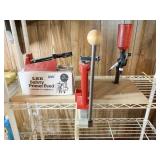 LEE SAFETY PRIMARY FEED TOOL MOUNTED ON WOOD,