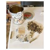 BRASS CASINGS, PEANUT TIN