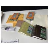 TWO NEW LAUNDRY BASKETS, TWO ENVELOPES OF TYPING