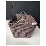 PLASTIC BROWN WOVEN BASKET WITH SILVER HANDLES