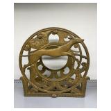 ART DECO CAST IRON MAGAZINE RACK FEATURING A