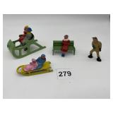 CAST IRON PAINTED SLEDDING FIGURES AND PARK BENCH