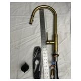 GOLD FINISH PULL DOWN HANDLE FAUCET HAS HAD LIGHT