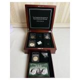 PARTIAL IKE DOLLARS IN BOX IN PRESENTATION CASE