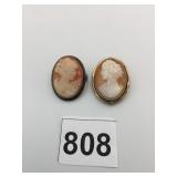 TWO CAMEO PIN BROOCH PENDANTS ONE GOLD TONE ONE