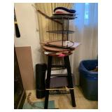 BACKLESS STOOL WITH ITEMS TAPED TO IT, CUTTING