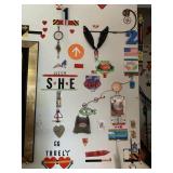 ITEMS ON WALL NEXT TO ART IN LIVING ROOM