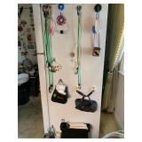 ITEMS ON SIDE OF AND BELOW FRIDGE, BUNGEES, FANNY