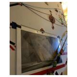 ITEMS HANGING ON RIGHT WALL OF STAIRS, SIGNS,