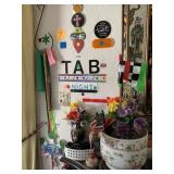 ITEMS ON WALL IN LIVING ROOM, 9