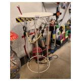 METAL PLANT STAND WITH BUNGEE CORDS ON IT 27