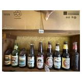 ASSORTED BEER BOTTLES MOST ARE SEALED CANADIAN