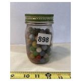 JAR OF MARBLES, ONE OR TWO GLOW