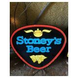 ILLUMINATED BACK WINDOW ADVERTISING FOR STONEYï¿½S