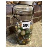 JAR OF MARBLES INCLUDING VINTAGE SHOOTERS AND