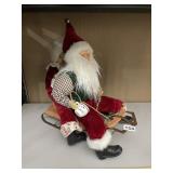 MR. AND MRS. CLAUSE ON SNOWBOARD SLED