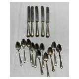 STERLING SILVER SPOONS AND KNIVES FIGURED AT ONE