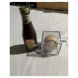 AUTOGRAPHED AL MARTIN IN LUCITE CASE AND BOTTLE