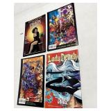 4 COMICS LIKE NEW CONDITION SEE PHOTO