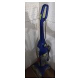 BLUE AND SILVER UPRIGHT VACUUM CLEANER WITH CLEAR