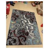 MACHINE-WOVEN AREA RUG WITH SCROLLING FOLIATE