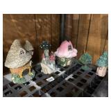 COLLECTION OF FIVE PAINTED RESIN FAIRY HOUSE
