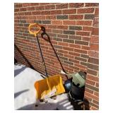 YELLOW PLASTIC SNOW SHOVEL WITH BLACK METAL